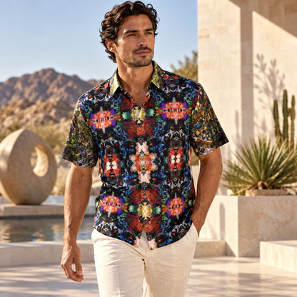Man wearing Desert Flowers Oasis ArtDogs men's short sleeve shirt at a desert-modern art resort