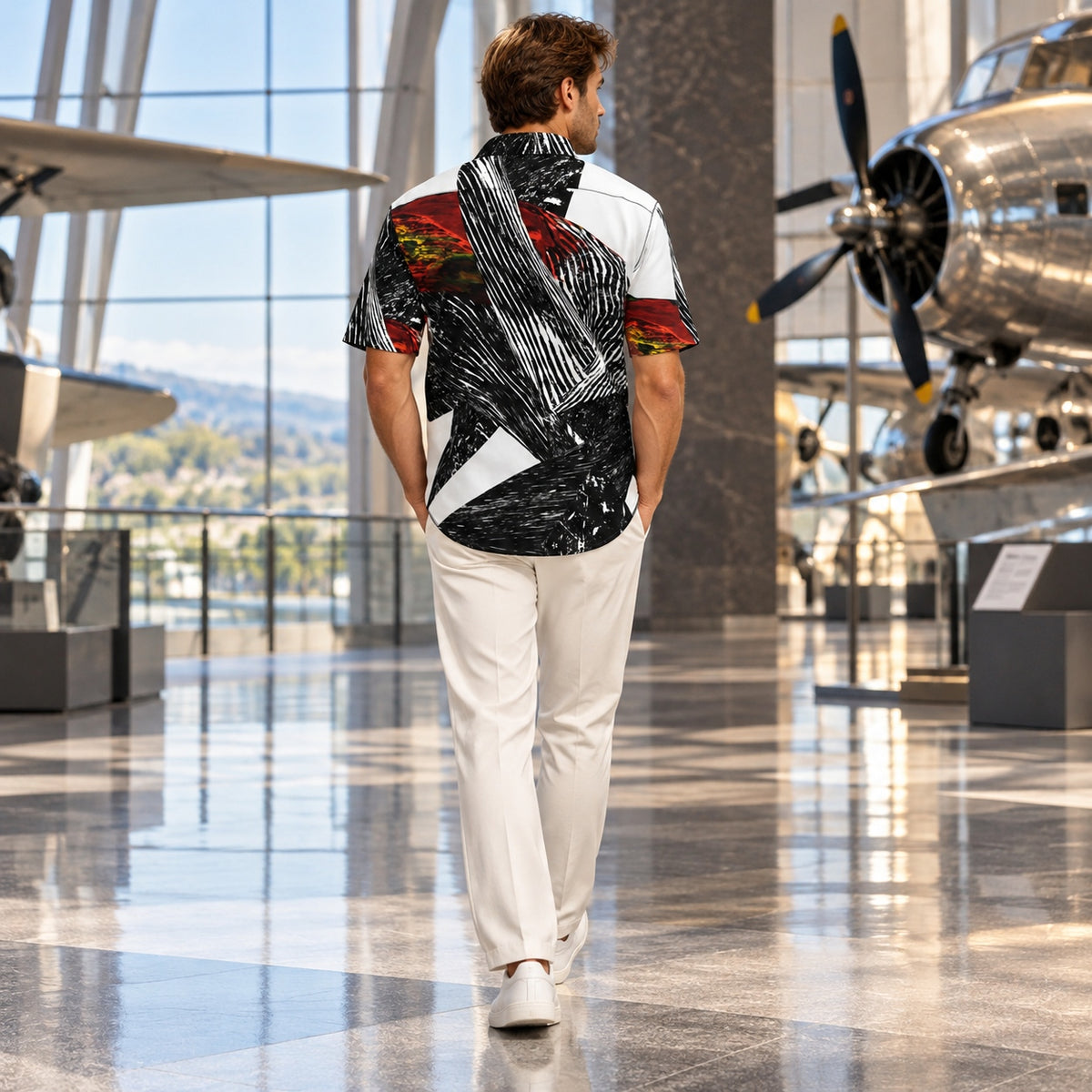 Man wearing Spirit of Flight 1 men's silk shirt from the back